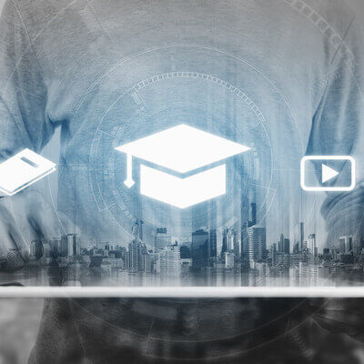 Online education, e-learning and e-book concept. a man using digital tablet for education, with education and online learning media icons